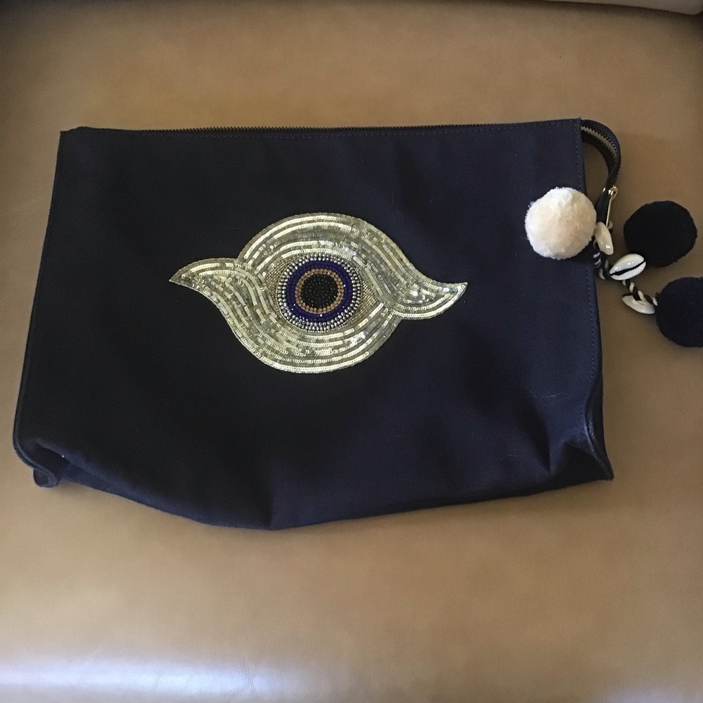 Figue navy blue clutch with sequined evil eye and Pom poms